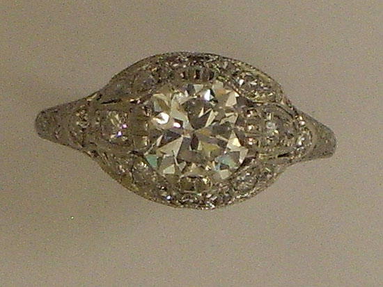 Platinum Ring With Diamond & Bead Setting