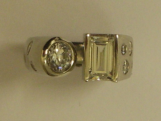 Platinum Round & Emerald Cut Diamond Ring