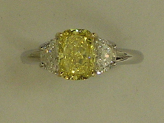 Platinum Ring With White Diamonds & An Intense Fancy Yellow Diamond