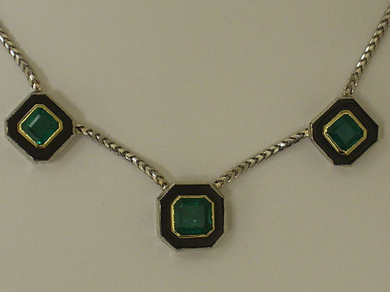Emerald, onyx, and gold necklace