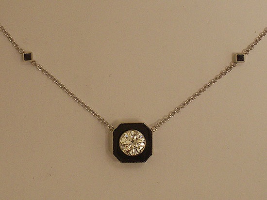 White Gold Chain With a Diamond Set Into Black Onyx