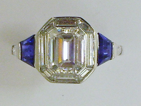 Platinum ring with Emerald cut diamond and bullet shaped Sapphires