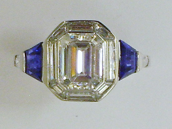 Platinum ring with Emerald cut diamond and bullet shaped Sapphires